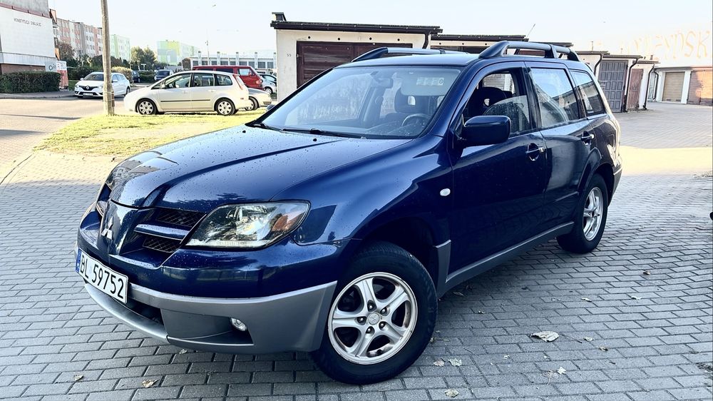 Outlander 2.0 Gaz sekw 4x4 naped 220 tys km Sluczny stan bardzo zadbany ZAMIANA