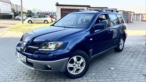 Outlander 2.0 Gaz sekw 4x4 naped 220 tys km Sluczny stan bardzo zadbany ZAMIANA