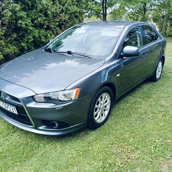 Mitsubishi Lancer 2010, 1,6, benzyna, 117 KM, HAK, system AS&G, przyciemniane szyby, doświetlanie zakrętów, halogeny