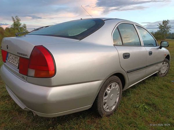 LPG Sprawny Zdrowy OC-09.2027r Przegląd-05.2027r CARISMA GL Hatchback-5D 1.6i 16V 100KM+GAZ.LPG.Sekw.03.2030r KLIMA ABS ESP SRS 4AirBg Centralny.Zamek